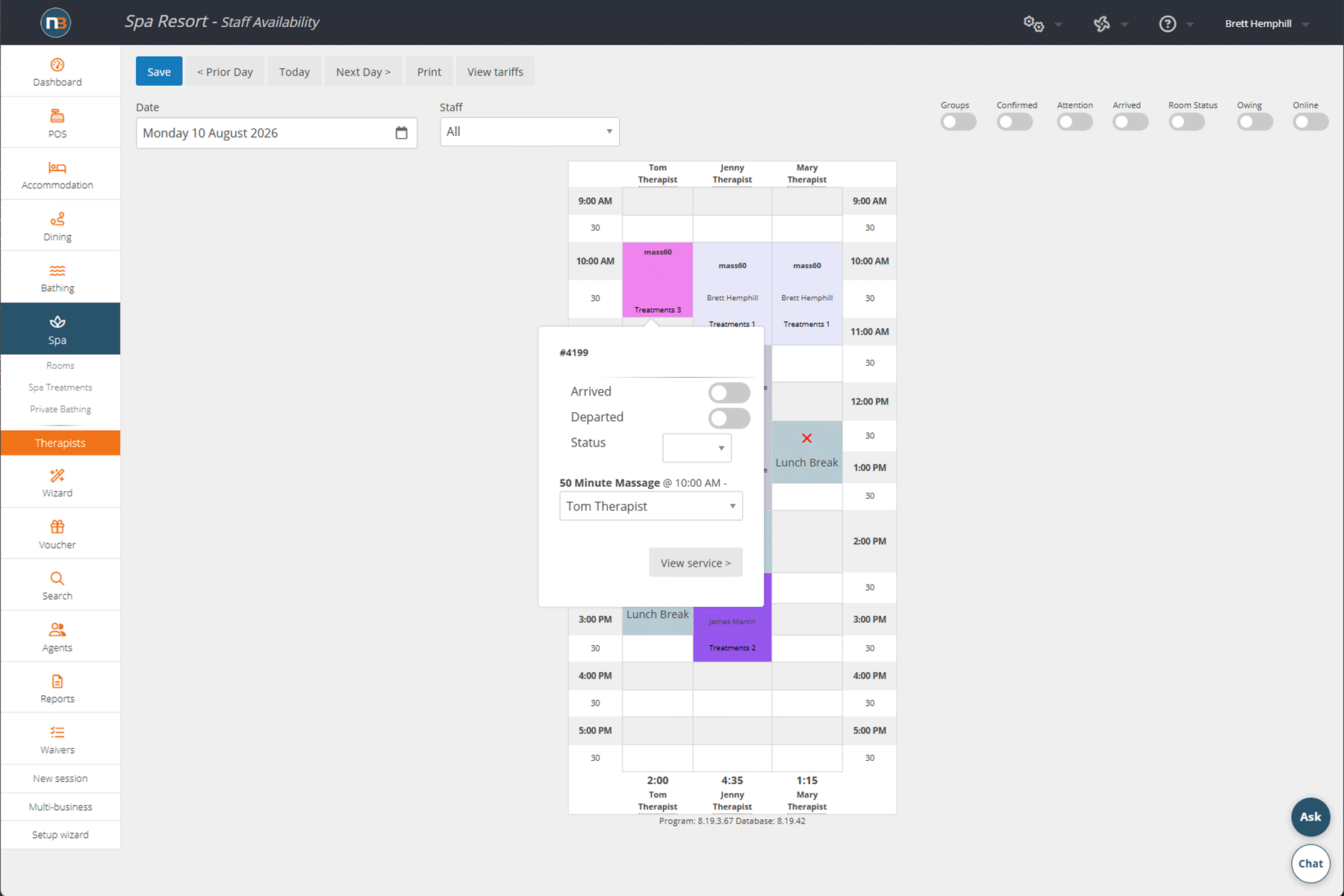 Netbookings staff availability calendar with a column per therapist, showing 10am massages against all three, lunch breaks blocked out with a red cross and their reason, and each therapist's total booked hours at the foot of the column